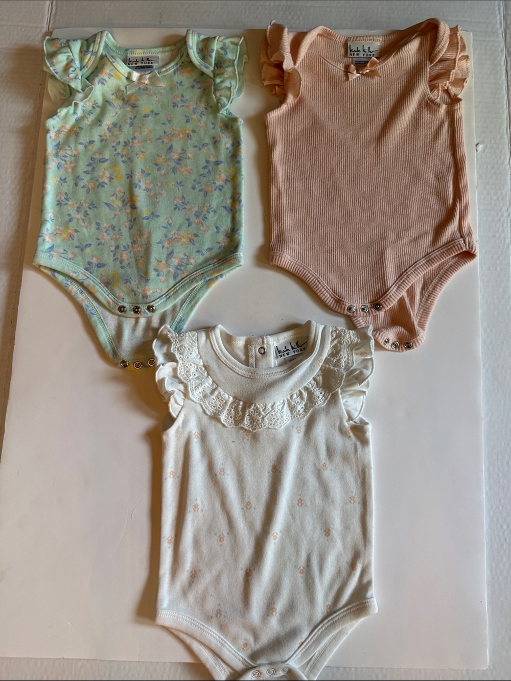 Nicole Miller bodysuits 6-9 mos like new